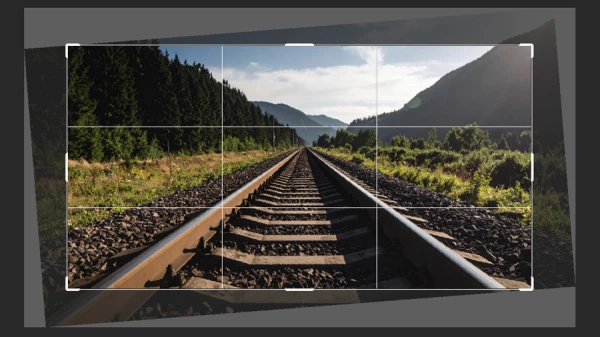 crop grid over the photo of a railroad track photo in photoshop