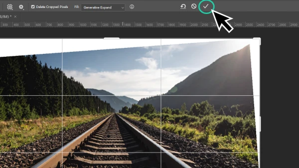 clicking the checkmark button in the tool options bar in photoshop